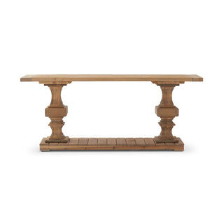 A rustic wooden console table with a rectangular top, two ornate turned pedestal legs, and a slatted lower shelf, shown against a plain white background.