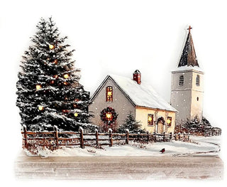 Lighted snowy town church Christmas silhouette with an evergreen tree, steeple, wreath, fence, and warm glowing windows.