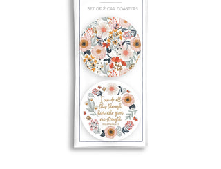 Packaged set of two floral ceramic car coasters featuring a garden pattern and Philippians 4:13.