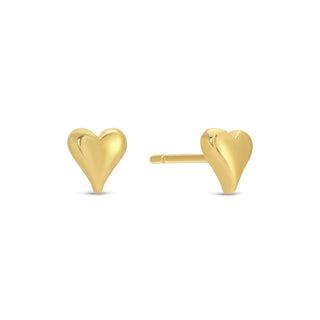 Gold heart-shaped stud earrings on a white background