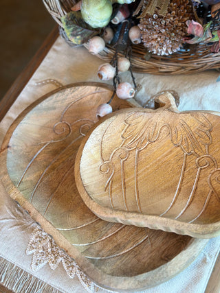 Mango wood pumpkin trays displayed together in two available sizes
