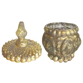 An ornate vintage brass or bronze decorative container with a matching lid, featuring textured embossed floral patterns and scalloped edges, shown on a plain white background.