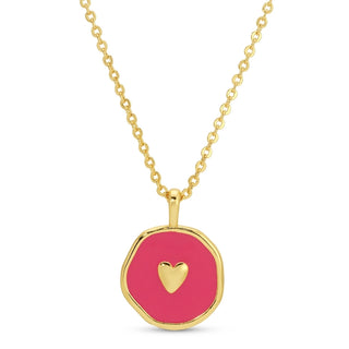 A gold chain necklace with a round, irregular gold pendant featuring a bright pink center and a small gold heart in the middle, shown on a plain white background.