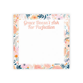 Floral dry erase note tile with “Grace Doesn’t Ask for Perfection” sentiment and a white reusable writing surface.