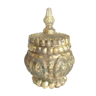 An ornate antique-style metallic lidded container or decorative pot with a pointed finial top, shown on a plain white background.